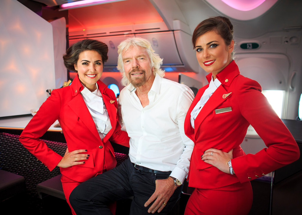 Richard Branson Virgin upper class bar with stewardesses